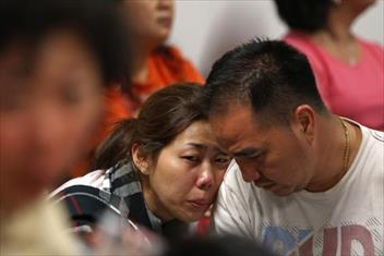 Vụ AirAsia: Hoãn chuyến bay phút cuối, gia đình 5 thành viên thoát nạn